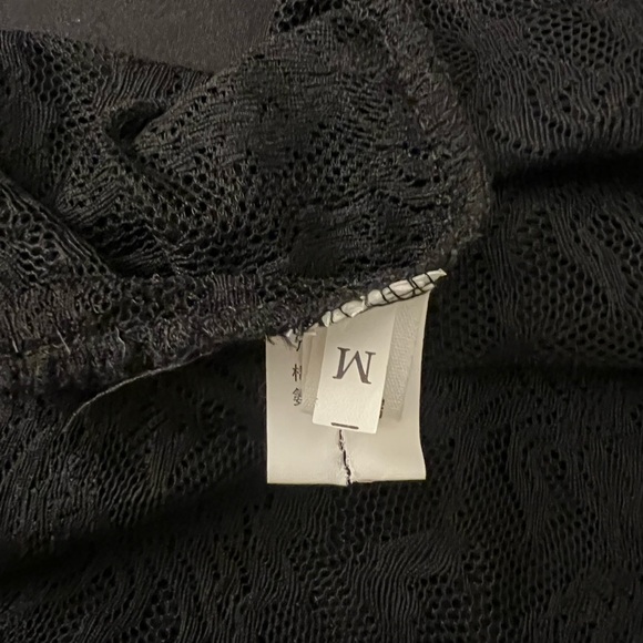 Black Lace long sleeve Top. Size: Med
Great condition; only worn one time. - Picture 8 of 8